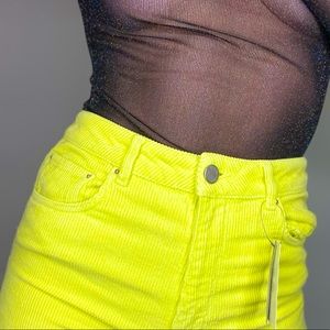 ASOS Corduroy neon yellow jeans, tags on
